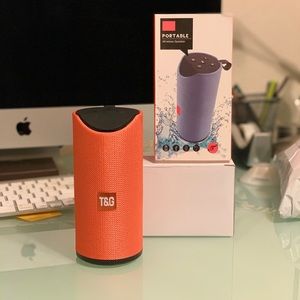 Brand new orange Bluetooth speaker